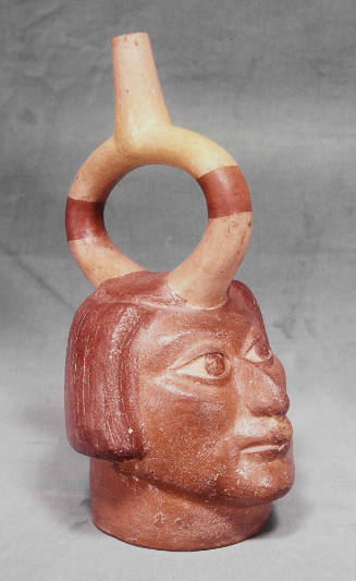 Stirrup spout vessel