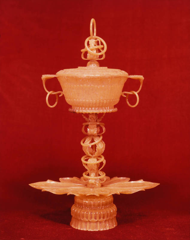 Covered bowl on tall stand