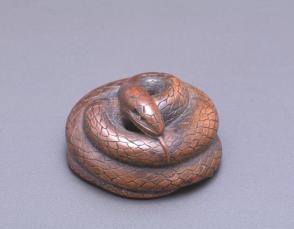 Netsuke modelled as a snake