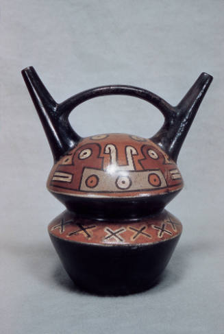 Double spouted vessel