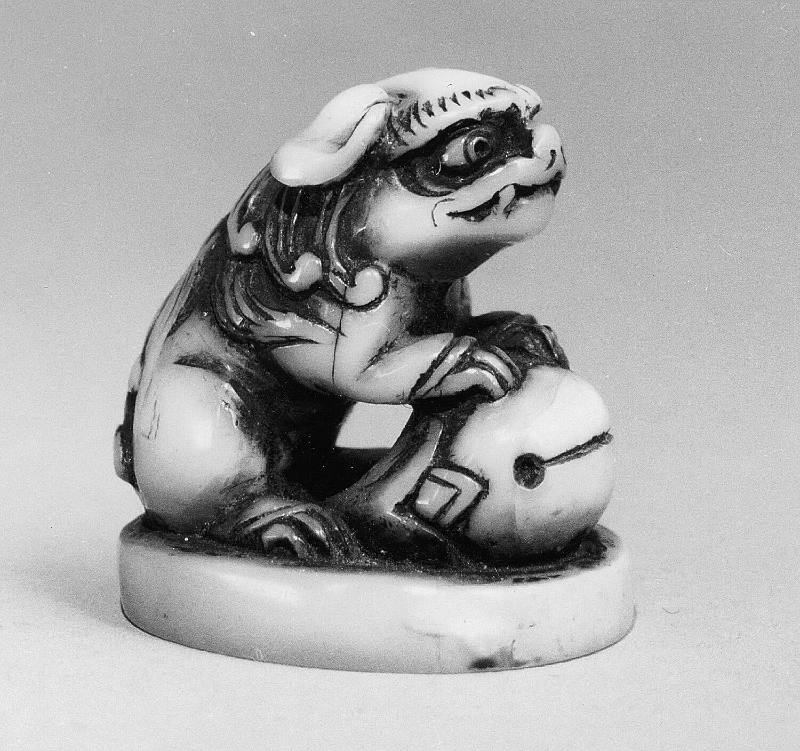 Shishi and a temple bell on seal