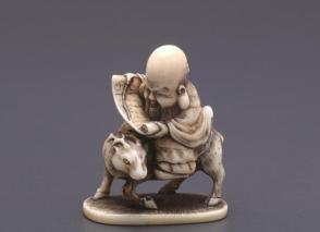 Netsuke modelled as Jurojin astride a deer