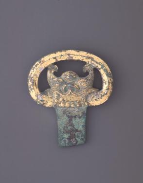 Pommel with mask head