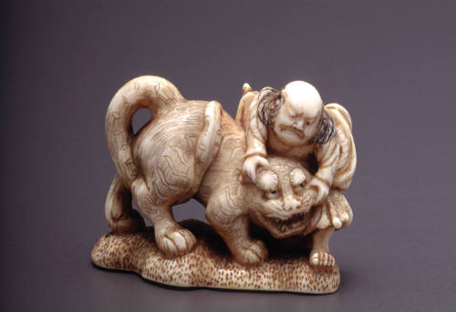 Netsuke modelled as Kusonoki and tiger
