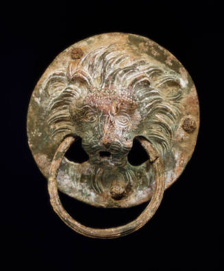Two lion's head handles