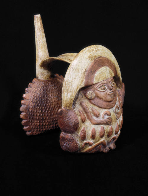 Double whistling stirrup jar-figure and fruit