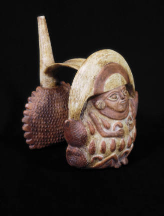 Double whistling stirrup jar-figure and fruit