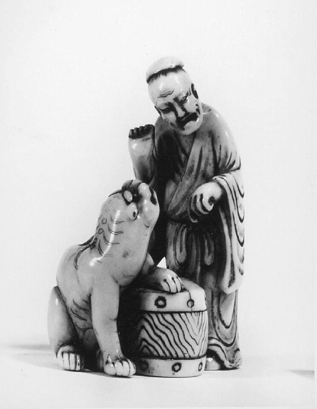 Chinese sage with tiger and drum