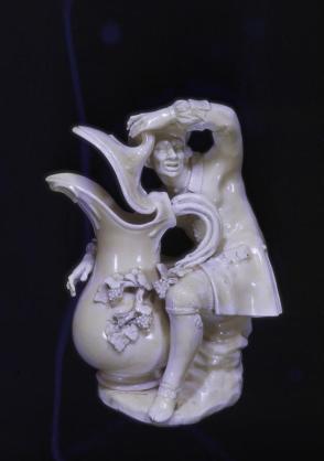 Figure of a man with large pitcher