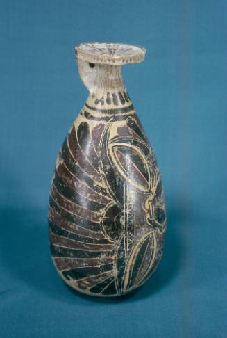 Oil or Perfume container:  Alabastron, Lotus Flowers