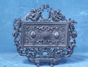 Mechanical device with foliate decoration