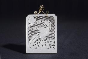 Pendant: Phoenix on rocks