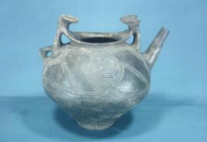 Spouted vessel with zoned cord-impressed decoration