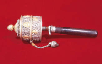 Buddhist hand prayer wheel