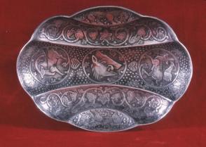 Silver repousse bowl, lobed