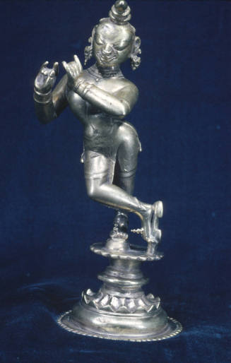 Krishna playing the flute