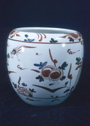 Vase with flower and bird decor