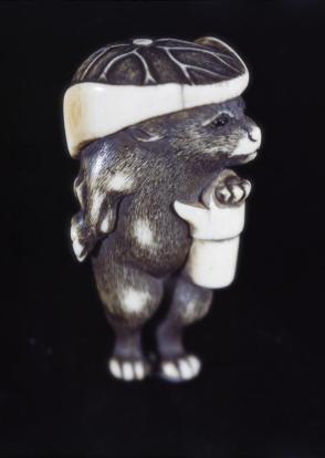 Badger with a lotus leaf hat