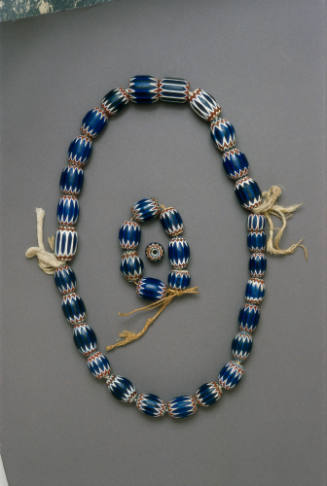 Necklace, bracelet, and bead