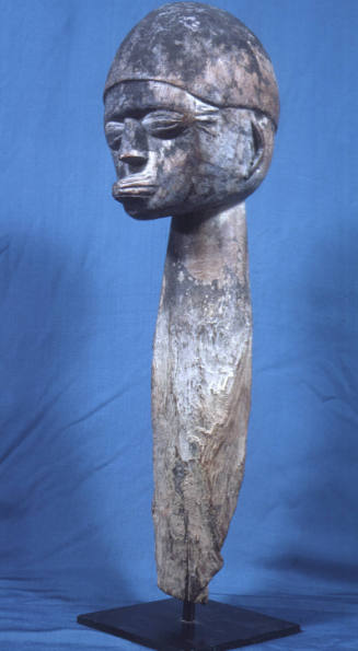 Ancestral head on post