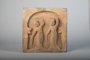 Relief with two dancers