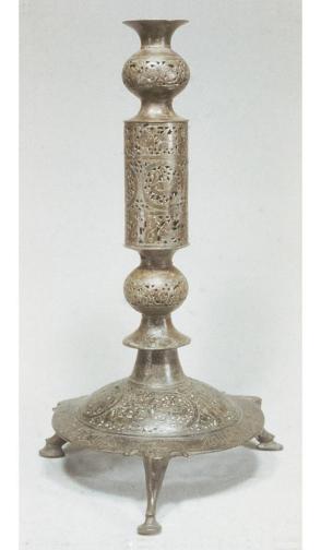 Openwork and engraved stand