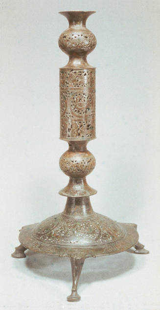 Openwork and engraved stand