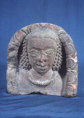 Relief fragment; female head