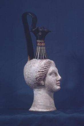 Funerary Vase with Trefoil Mouth; Woman's Head