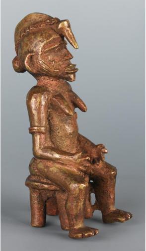 Female figure seated on stool:  Sandogo society divination figure