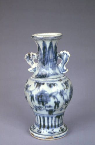 Vase with winged handles