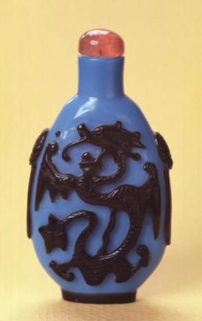 Snuff bottle, black cameo dragon relief