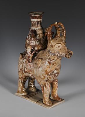 Container in the form of a bull bearing a pot