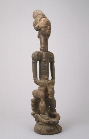 Seated male figure