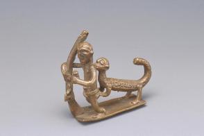 Gold weight:  leopard attacking man