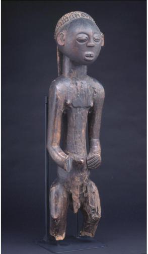 Male figure with balamwezi (the rising of the new moon) pattern